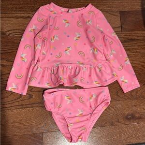 Unicorn and rainbows two piece Rashguard swim suit. Toddler size 2.